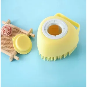 Multifunctional silicone pet bath brush, dog and cat grooming massage tool with liquid dispenser.