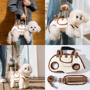 Canvas pet carrier bag for small dogs cats, portable shoulder handbag with leash and vents.