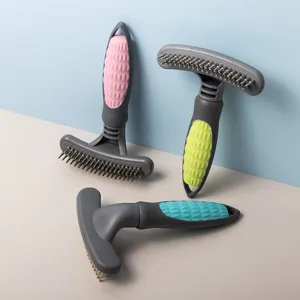 Pet deshedding brush for dogs and cats, stainless steel dematting comb with anti-slip handle.