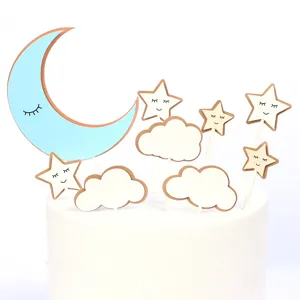 Cute moon star and cloud cake toppers with cartoon faces for party decoration