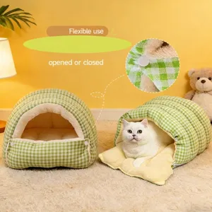 Detail view of checkered pet bed showing flexible open and closed cave design