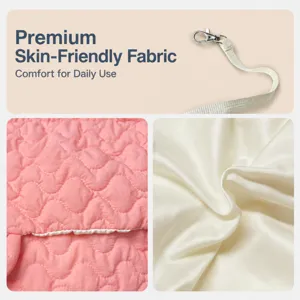 Detailed view of breathable pet carrier bag with quilted pink fabric and safety buckle strap.