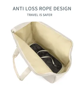 Detail shot of pet carrier bag interior, showing soft plush mat and safety anti-loss strap.