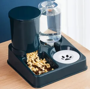 Pet automatic feeder and waterer double bowl set for cats and dogs, durable plastic design.