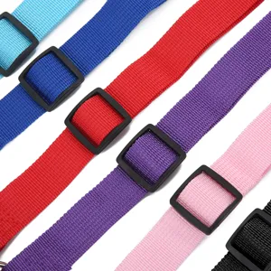Colorful pet car safety seat belts with adjustable plastic buckles, durable nylon straps.