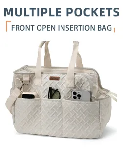 Portable pet carrier bag with multiple pockets, front open design, breathable and stylish canvas.