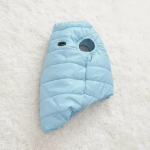 Detailed view of light blue winter pet padded vest, warm dog cotton coat close-up.