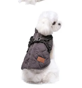Detail view of the warm quilted dog vest showing integrated harness straps and durable buckle.