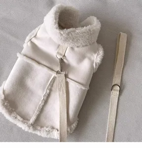 Detailed closeup shot of white pet fleece vest harness, warm winter warm puppy coat.