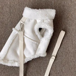 Detail shot of white fleece pet vest, soft plush collar texture and integrated traction harness.