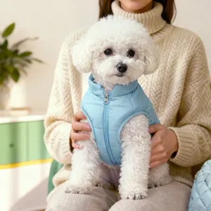 Close-up detail of winter warm pet quilted vest, soft padded fabric, cozy jacket for dogs.