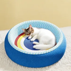 Large round sisal cat scratching bed with colorful rainbow design for cats resting and playing.