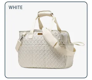 Portable quilted pet carrier bag with shoulder strap, breathable design for cats and dogs.