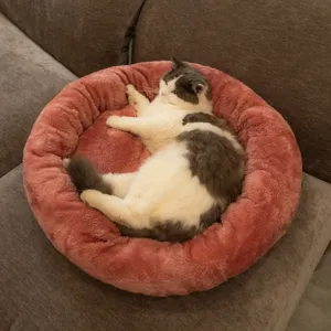 Cozy pink plush round pet bed detail, soft warm fluffy cat nesting bed for small dogs cats.