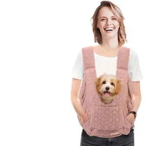 Pink quilted pet carrier vest for small dogs and cats, comfortable and portable outdoor bag.