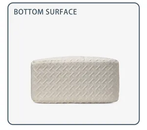 Detailed bottom view of a stylish woven design white bag, clean minimalist commercial shot.
