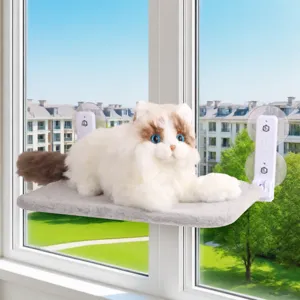Foldable window cat hammock with strong suction cups and plush toy for indoor sunbathing.