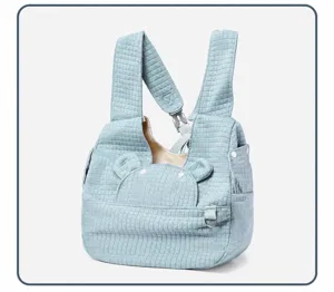 Light blue pet backpack detail, breathable grid fabric with cute bear ears and straps.