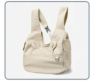 Detailed view of the quilted pet carrier backpack in white, showing breathable design and straps.