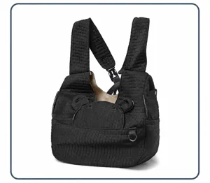 Black quilted pet carrier backpack with cute bear ears, breathable and comfortable for small dogs.
