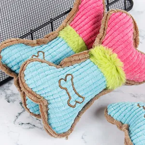 Joli jouet à mâcher en peluche en forme d'os pour chien et chat, jouet de dentition durable.