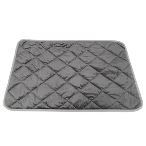 Grey quilted pet thermal heating mat for cats and dogs, soft and comfortable winter bed.