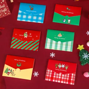 Set of creative Christmas greeting cards with festive animal patterns and envelopes.
