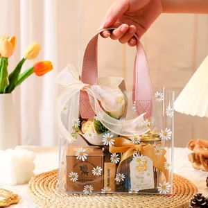 Bolsa de regalo transparente creativa con estampado de margaritas para bodas y cumpleaños