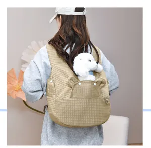 Breathable quilted pet backpack with cute bear ears design for small cats and dogs daily travel.