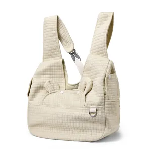 Quilted pet carrier backpack for cats and small dogs, breathable outdoor travel bag with cute ears.