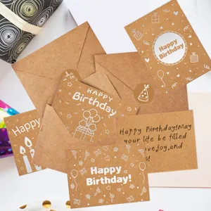 Detailed view of kraft paper birthday cards with envelopes and handwritten greetings