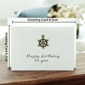 Detailed measurements of creative birthday card with bronze steering wheel charm