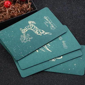 Tarjetas de felicitación de Navidad verde oscuro con elegante reno en pan de oro