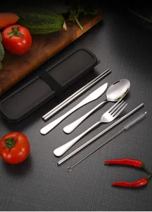 Close-up of 304 stainless steel portable cutlery set including straw and brush