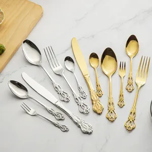 Elegante set di posate in acciaio inox 304 con rilievo traforato in oro e argento.