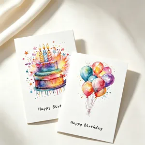 Detailed view of watercolor hand-painted birthday cake and balloons on textured cards