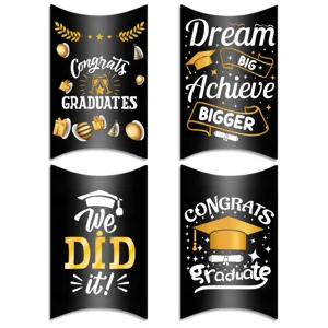 Decorative black graduation pillow candy boxes featuring gold and white congrats text