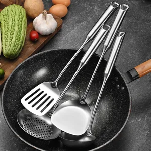 Professional 4-piece thickened 316 stainless steel kitchen utensil set inside a wok