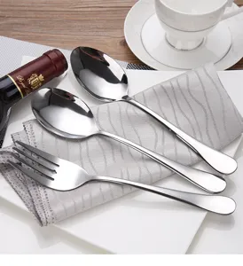 Premium stainless steel cutlery set featuring two serving spoons and a service fork