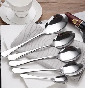 Detailed macro view of high-quality stainless steel spoons in various sizes for dining service