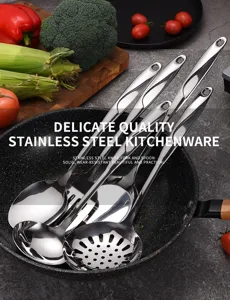 Close-up of stainless steel kitchen utensils with hollow S-shaped handles in a wok