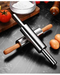 Detail of a heavy duty professional stainless steel rolling pin with wooden handles