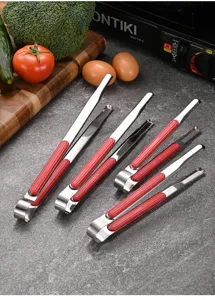 Stainless steel food tongs with red non-slip handles in various sizes