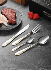 Elegant stainless steel cutlery set with double gold line detail on handles.