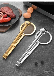Detailed view of 304 stainless steel food tongs with an integrated mesh strainer