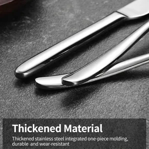 Close-up of high-quality 304 stainless steel cutlery set handles on textured surface