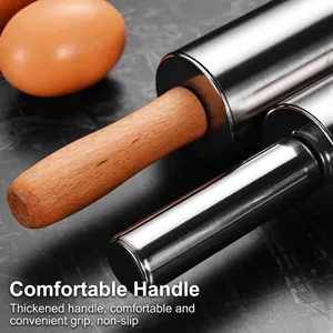 Professional stainless steel rolling pin with wooden handle for dough and pastry.
