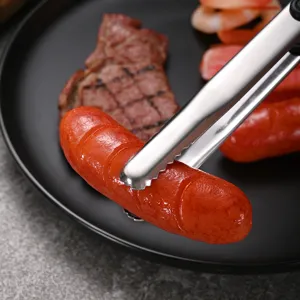 Professional stainless steel food tongs with non-slip black handle for BBQ and kitchen serving