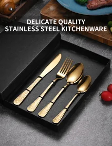 Elegant gold embossed stainless steel cutlery set presented in a stylish black gift box