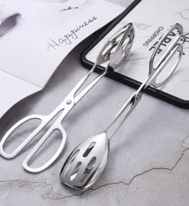 Close-up of 304 stainless steel hollowed-out food tongs with scissor style handles.